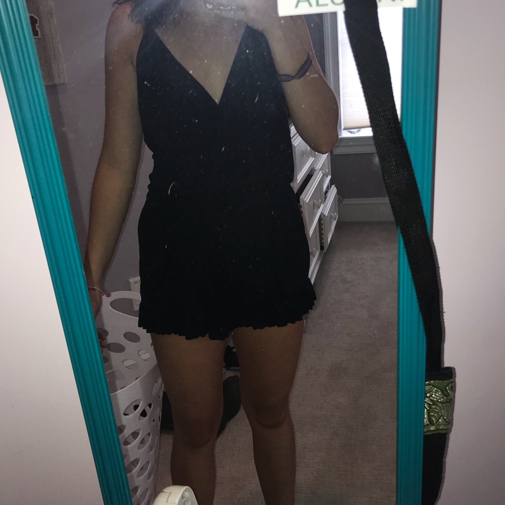 Black romper with ruffles